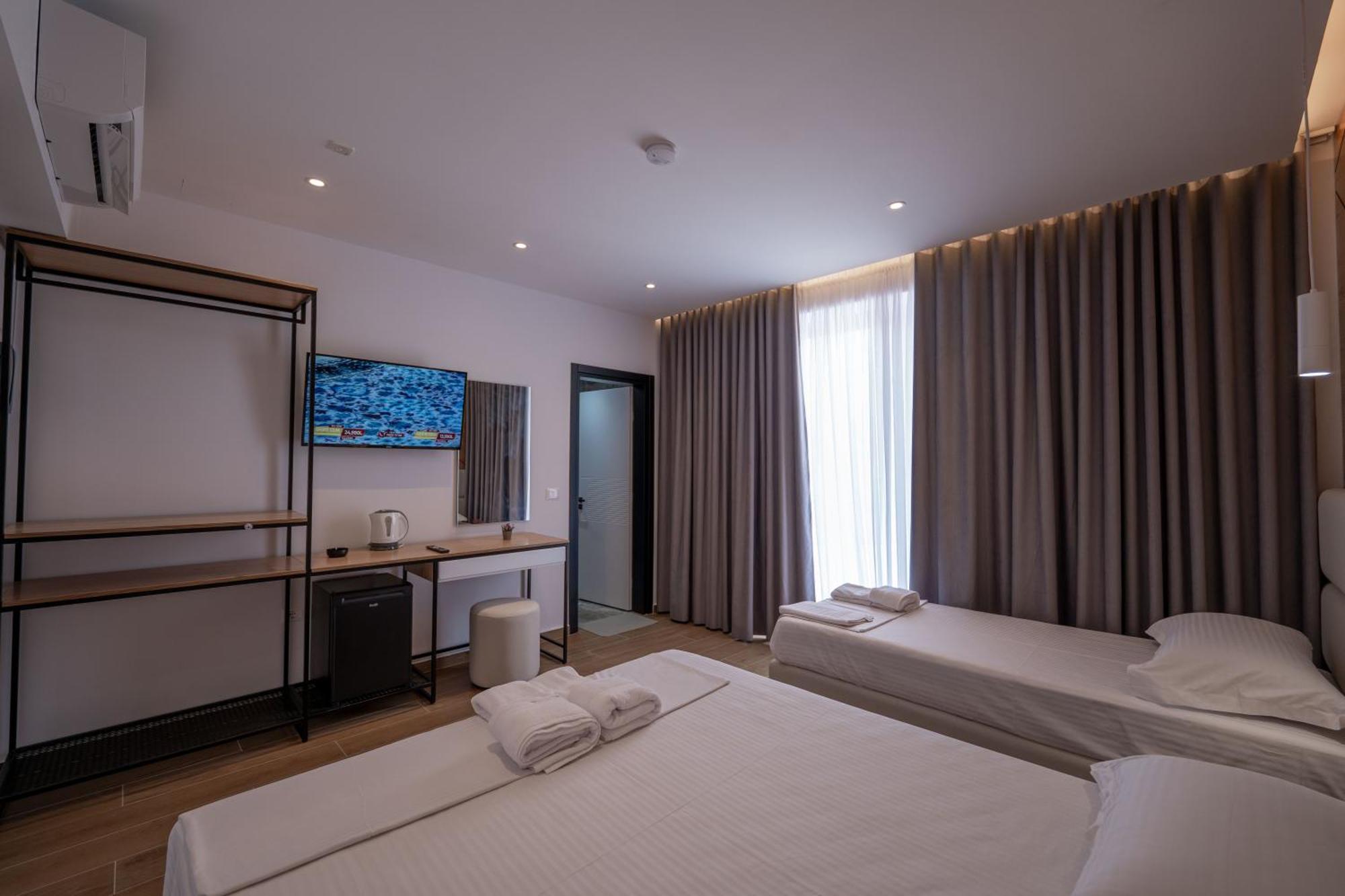 Aboja Inn Ксамил Экстерьер фото