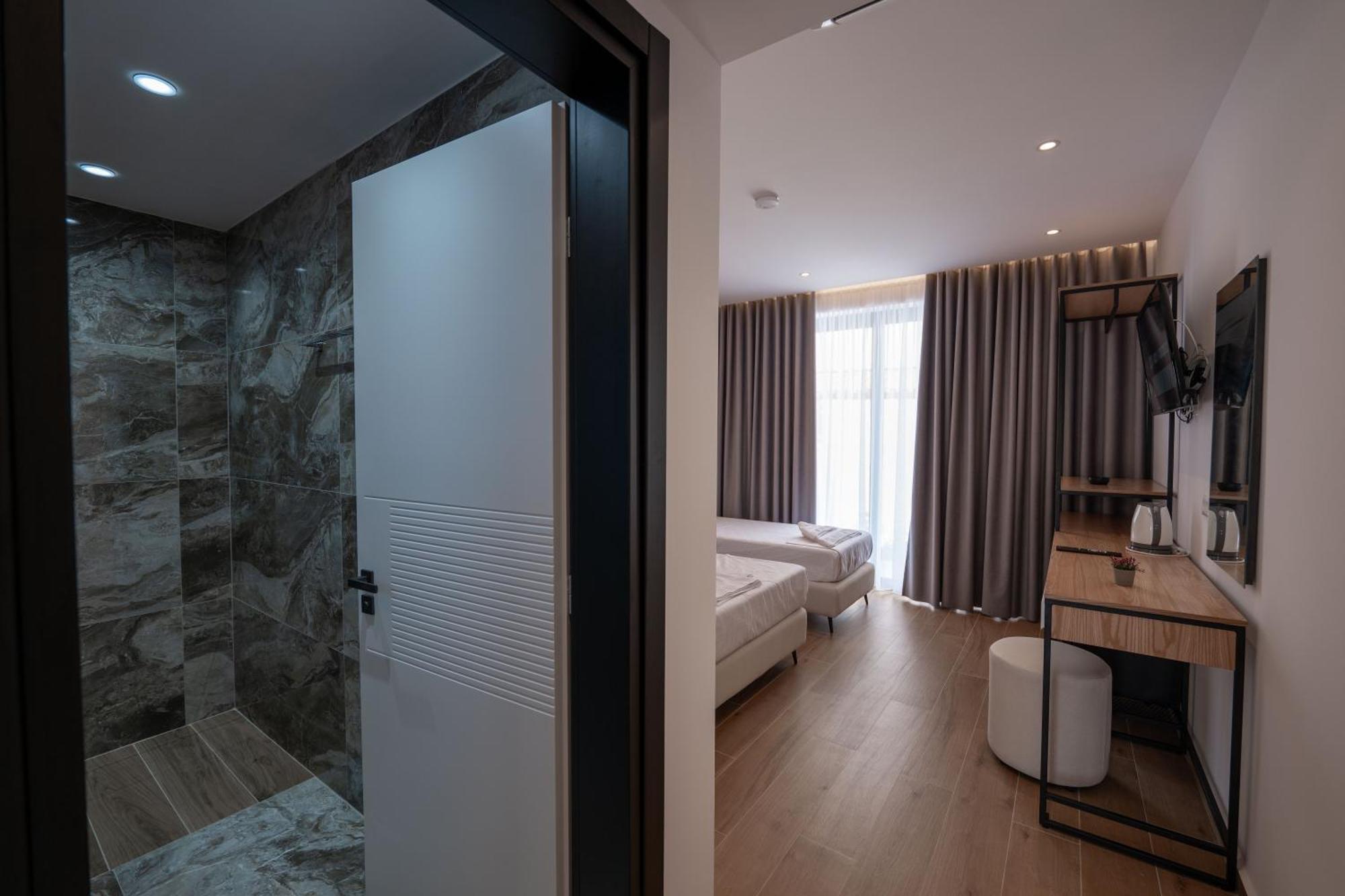 Aboja Inn Ксамил Экстерьер фото